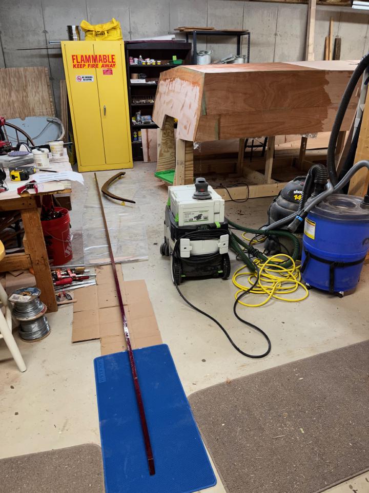 Sealing the keel and stem with epoxy to prevent the purpleheart from rotting down the road