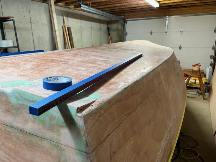 Preparing to glue down the bilge keels