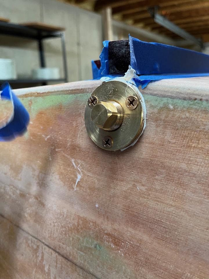 The drain plug, with the tape removed