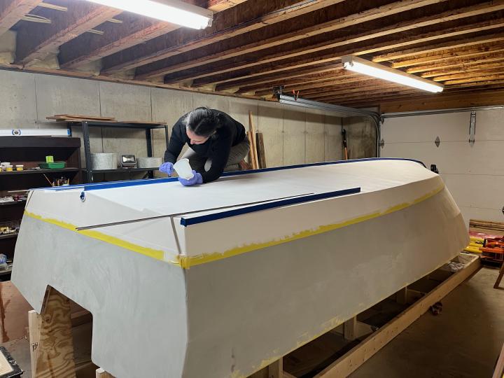 Epoxy sealing the screw holes for the stainless keel guard